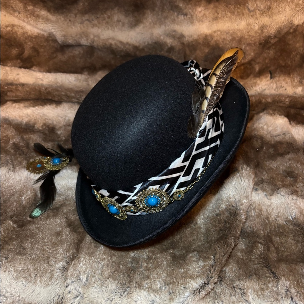 Elegant Black Feathered Hat with Blue Accents